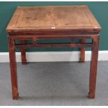 A 19th century Chinese hardwood square centre table, with pierced frieze on block supports,