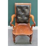 A 19th century French walnut framed armchair, with solid seat on turned supports,