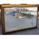 A large 19th century gilt framed wall mirror,