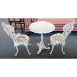 A pair of Victorian white painted cast iron garden chairs, 39cm wide,