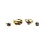 A pair of 9ct gold, diamond and ruby set oval cluster ear studs,