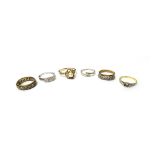 A gold and diamond set ring mount, (the central gemstone lacking),