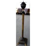 A Regency style patinated bronze and brass oil lamp standard base, of Corinthian column form,