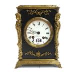 A French brass mounted mantel clock, late 19th century/ early 20th century,