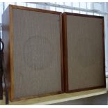 A pair of Tanoy Speakers, circa 1970, teak cased with acoustic cloth fronts, stamped 'ET52',