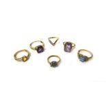 A 9ct gold ring, mounted with a cut cornered rectangular cut amethyst, Chester 1961,