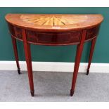 A George III satinwood inlaid mahogany demi-lune console table, on tapering square supports,