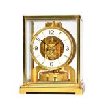A Jaeger Le Coultre brass cased Atmos clock, serial No.564677, of canted rectangular form, 22.