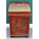 An early 19th century mahogany slide top Davenport, with four side drawers,
