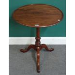 A George III mahogany occasional table, the dished circular snap top on tripod base,