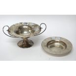 Silver, comprising; a twin handled bonbon bowl, of shaped circular form,