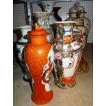 A group of large decorative vases, including a Chinese export style vase and cover,
