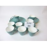 A vintage Poole Pottery Cameo Celeste Green tea set for six including milk jug c.