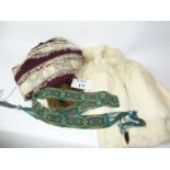 A fur jacket and other fur items, together with an embroidered purple Kenyan cloak,