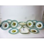 A 19th century Minton's dessert set comprising basket and comport and 8 plates each hand painted