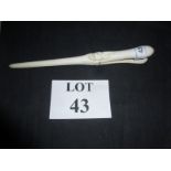 A pair of late 19th/early 20th century ivory glove stretchers (small chips) carved with monogram