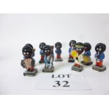 A collection of nine painted plaster Robertson Golly Wog figures est: £25-£45 (O2)