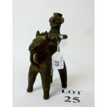 An antique naive ethnic bronze figure of a man riding a horse, probably Benin, 18.