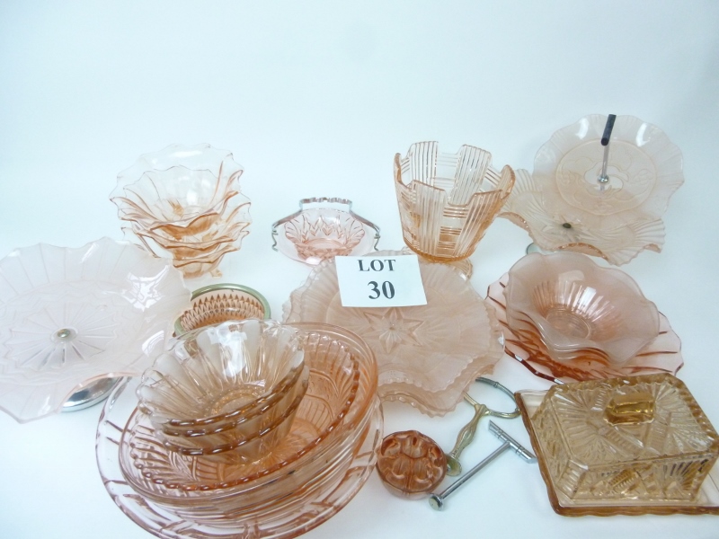 A quantity of pink pressed glassware to include a cake stands est: £30-£50 (BB22)