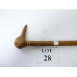 A Pitcairn Island walking stick the handle carved as a bird's head est: £25-£45 (J)