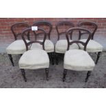 A set of six Victorian balloon back dining chairs upholstered in cream est: £150-£250