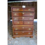 A 20c mahogany chest of six long drawers with brass handles and bracket feet est: £100-£150