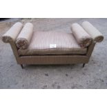 A mid 20c window seat with reclining ends and a large loose cushion seat and two bolster cushions