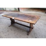 A 20c oak refectory dining table with centre stretcher seats 8-10 est: £80-£120