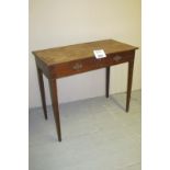 A c1900 oak side table with two frieze drawers over tapering legs est: £40-£60