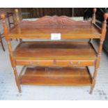 An Edwardian mahogany buffet table with three shelves and two central drawers est: £55-£85