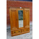 A fine Victorian satinwood large wardrobe with central mirror door over drawers est: £150-£250