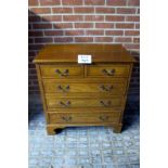 An early 20c solid chest of two short over three long drawers with inlaid ebony and box wood