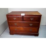 A late 19c walnut chest of two short over two long drawers with brass handles est: £50-£80