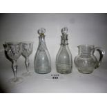 Two 19th century decanters; a pair of decorative wine goblets;