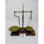 A set of W & T Avery Ltd mahogany and brass counter-top scales with brass weights est: £30-£50