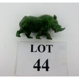 A green carved rhino figurine est: £15-£25 (N1)