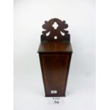 A 19th century mahogany candle box with fret carved back est: £30-£50 (A wall)