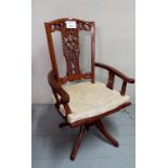 A Chinese swivel desk chair in good condition est: £100-£150