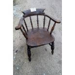 A 19c elm seated Captain's chair est: £30-£50