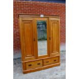 A fine Victorian satinwood large wardrobe with central mirror door over drawers est: £100-£150