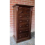 A Victorian rosewood Wellington chest with seven graduated drawers,