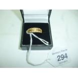 An 18ct gold ring inset with two bands o