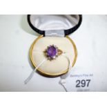 An 18ct gold amethyst and diamond ring (