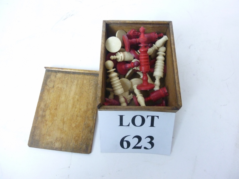 A red and natural bone chess set (a/f) e