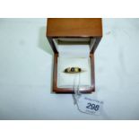 An 18ct gold topaz and diamond ring (siz