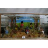 A vintage shop diorama containing a coll