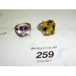 A citrine ring marked 925 (size N) and a