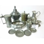 A quantity of pewter to include a large