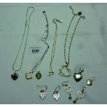 A collection of heart associated pendant