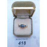 A diamond and sapphire set ring (size N) boxed est: £40-£60